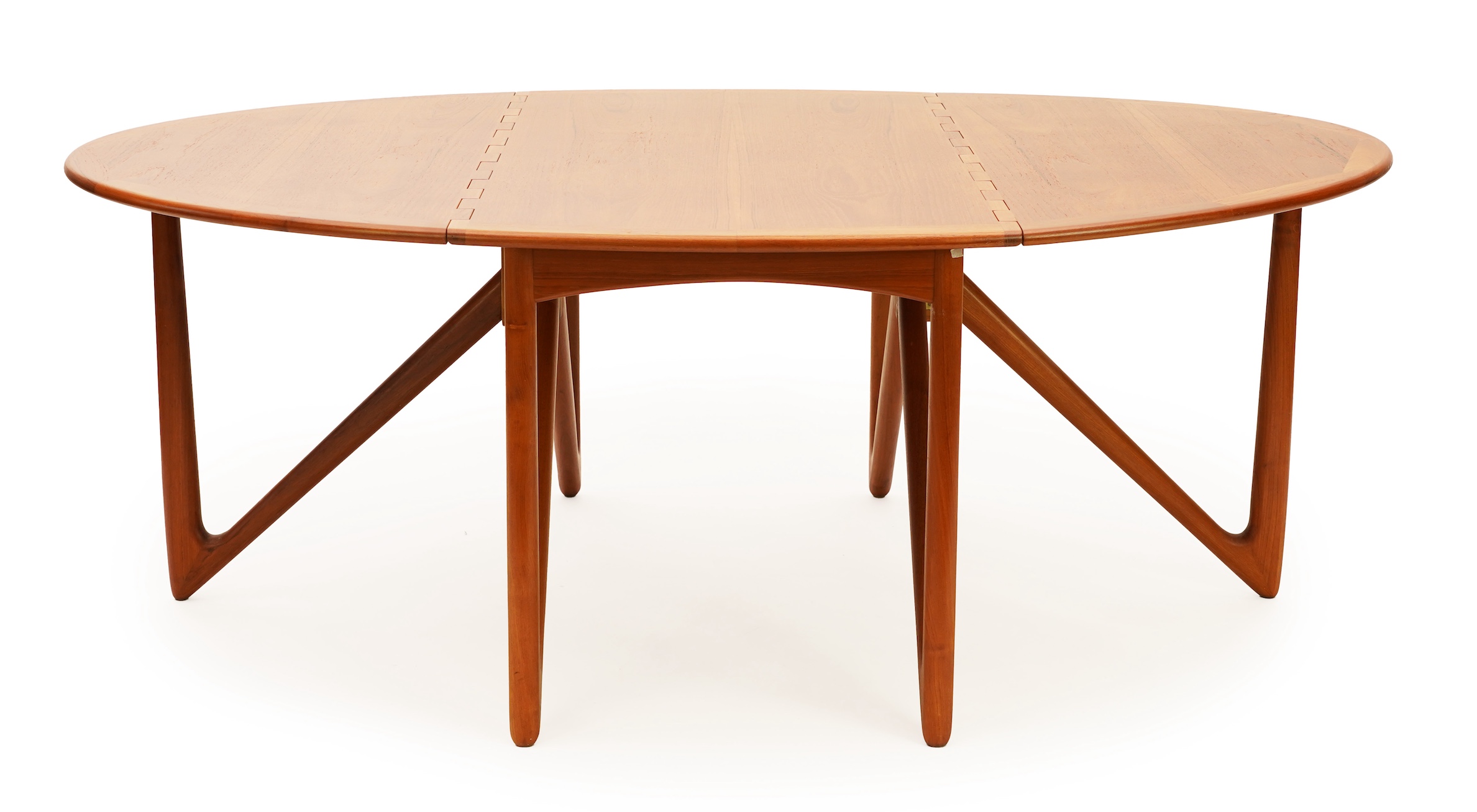 Niels Koefoed (Danish, b. 1929) for Koefoeds Møbelfabrik: A teak 'Oval Klap' dining table